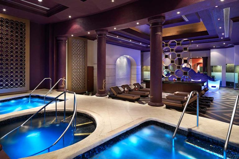 The interior of the hard rock spa, jacuzzis and lounge chairs.