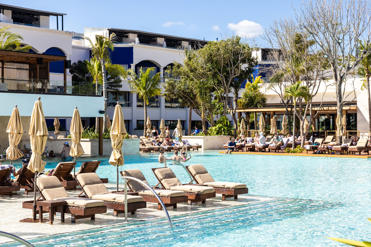 The Eden Pool with lounge chairs surrounding it.