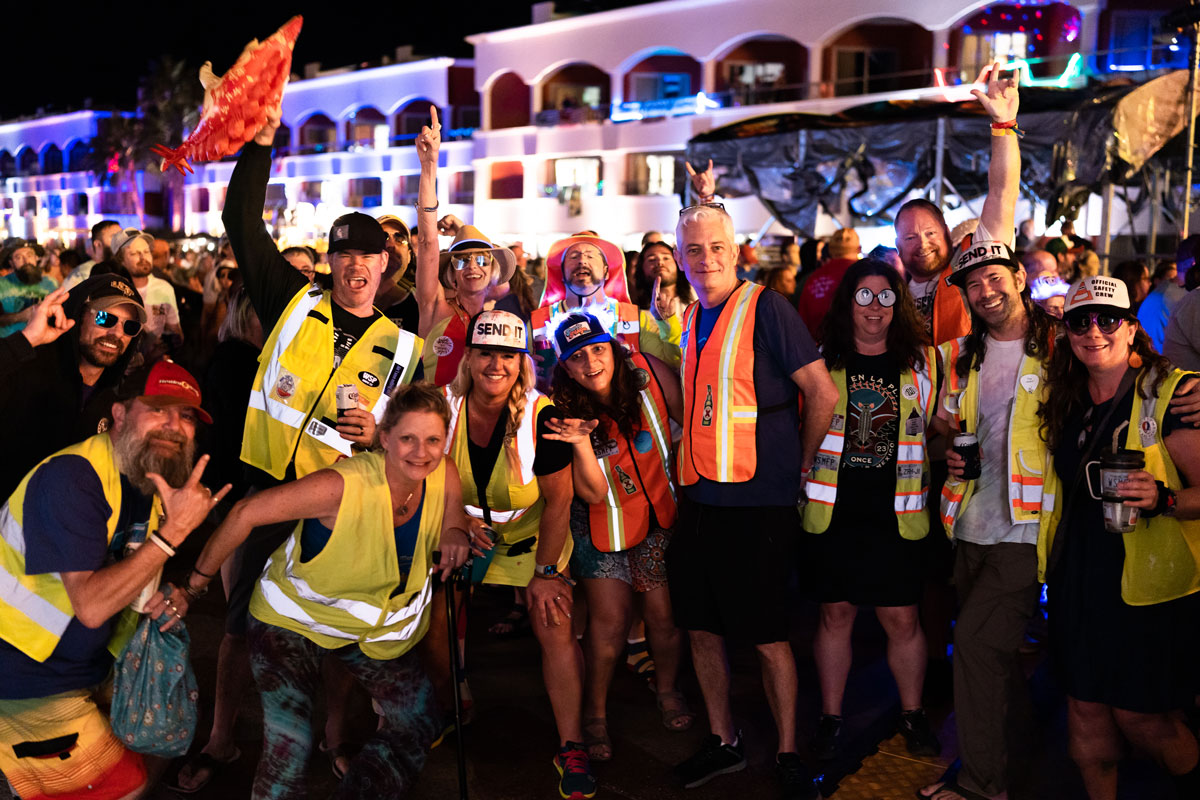 A group photo of guests in matching theme night costumes.