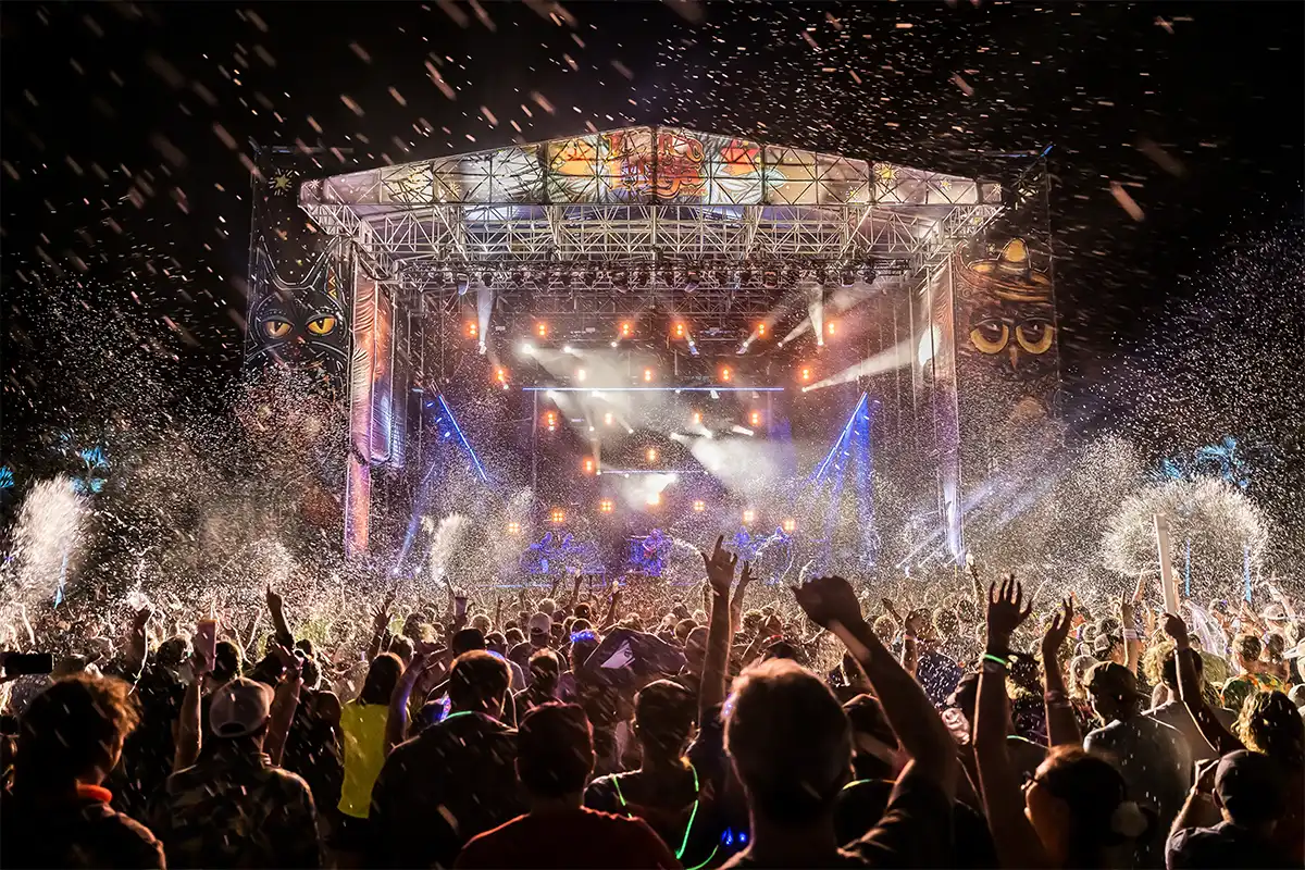 Point of View photo from the crowd of the Main Stage during the song Chilly Water, water thrown in the air.