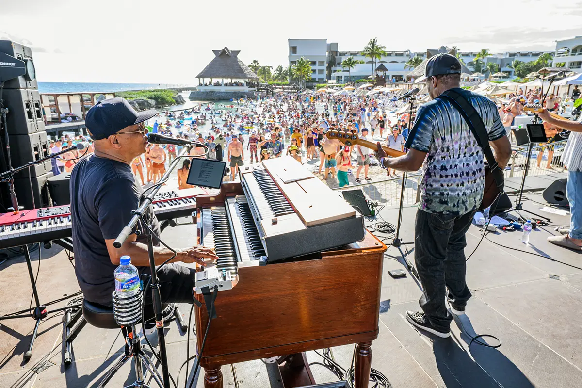 Ivan Neville and Tony Hall playing with the Playa Allstars on the Beach Stage.